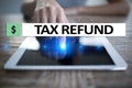 Tax refund text on virtual screen. Business and Finance concept. Royalty Free Stock Photo