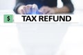 Tax refund text on virtual screen. Business and Finance concept. Royalty Free Stock Photo