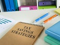 Tax savings strategies and business papers on the desk Royalty Free Stock Photo