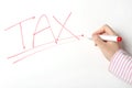 Tax sign on whiteboard Royalty Free Stock Photo