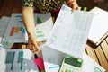 Closeup on modern accountant woman with documents in office Royalty Free Stock Photo