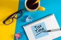 Tax Time Concept On office manager desk. Notification of the need to file tax returns, tax form