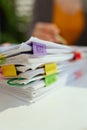 tax time. documents and accountant woman in background working Royalty Free Stock Photo