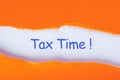 Tax time - inscription in a torn orange envelope. Notification of the need to file tax returns, tax form