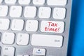 Tax time - Key on keyboard - Notification of the need to file tax returns, message for accountant - fill in tax form