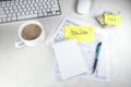 Tax time - Notification of need to file tax returns, tax form at accountant`s workplace. Top view of notepad, stickers, cup of