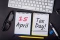 Tax time -15th April 15 - Tax day in USA. Notification of the need to file tax returns, tax form at accauntant workplace