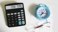 Tax Time word on calculator. Business and tax concept. Time to pay tax in year Royalty Free Stock Photo