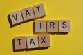 Tax, VAT, IRS, word and acronyms on yellow