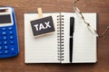 TAX sign on the small notebook