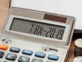 Tax word and 2019 number on calculator. Business and tax concept. Pay tax in 2019 years