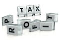 TAX word written on glossy blocks and fallen over blurry blocks with PROFIT letters. High taxes are reducing companies` profits -