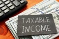 Taxable Income is shown on the business photo using the text