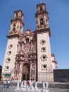 Beauty Santa Prisca cathedral church in colonial spanish baroque style at Taxco city center in Mexico - vertical Royalty Free Stock Photo