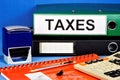 Taxes are mandatory gratuitous payments levied by the Central government or local authorities. Royalty Free Stock Photo