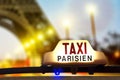 Taxi against the Eiffel tower Royalty Free Stock Photo