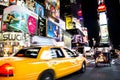 Times Square, New York City, New York, United States - circa 2012 taxi cab driving in times square night motion blurry Royalty Free Stock Photo