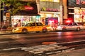 A taxi cab is stopped by a patrol car Royalty Free Stock Photo