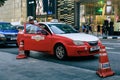 Taxi cab waiting for passengers in front of the Pavilion Shopping Mall in Kuala Lumpur.