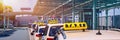Taxi cabs waiting for passengers. Yellow taxi sign on cab cars. Taxi cars waiting arrival passengers in front of Airport Gate. Royalty Free Stock Photo
