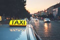 Taxi car on the city street Royalty Free Stock Photo