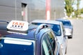 Taxi car parked in Bordeaux city with blurred background in selective focus France