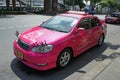 Taxi car in the street of Bangkok decorated with Hello Kitty cartoon series in the style of Thailand, October 20