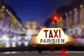 Taxi at the champs elysees Royalty Free Stock Photo