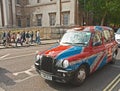 Taxi covered by Union Jack Flag