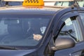 A taxi driver in car stuck in the traffic jam Royalty Free Stock Photo