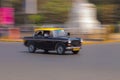 Taxi in Mumbai photographed in motion unsharpness Royalty Free Stock Photo