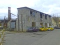 Taxi near the ruined house