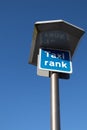 Taxi Rank sign on a tall metal pole