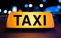 Taxi sign light on the street Royalty Free Stock Photo