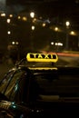 Taxi sign at night