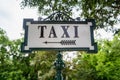 Taxi sign on the street in Europe - antique, european style