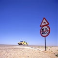 Taxi speeding in the desert on the Jordan highway Royalty Free Stock Photo