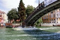 Taxi under the bridge Ponte dell'Accademia in Venice, Italy Royalty Free Stock Photo