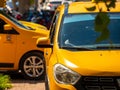 Taxi yellow cars on the street among the traffic Royalty Free Stock Photo