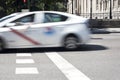 Taxicab crossing Madrid downtown