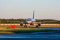 Taxiing passenger airplane at the early morning