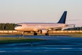 Taxiing passenger aircraft at the early morning