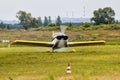 Taxiing of a small sports plane on the airfield Royalty Free Stock Photo