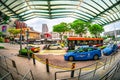 Taxis Stand at Bugis Junction with Bugis Street market and Bugis Plus in the background. Royalty Free Stock Photo