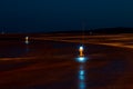 Taxiway, side row lights at the night airport Royalty Free Stock Photo