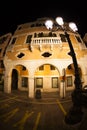 Taxy parking under lanp at Chioggia Royalty Free Stock Photo