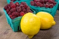Tayberries and lemons for cooking Royalty Free Stock Photo