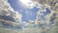 Cumulus clouds against the blue sky.