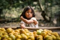 Tayrona, Magdalena, Colombia - March 09 2021: portrait of an Kogui indigenous kid in the Parque Natural Tayrona, Magdalena, Colom