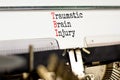 TBI traumatic brain injury symbol. Concept words TBI traumatic brain injury typed on retro old typewriter on a beautiful white